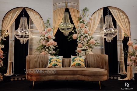 Gorgeous and stylish sofa setting with chandeliers