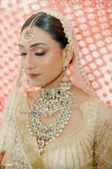 Lovely bridal closeup with layered jewellery and the most subtle makeup look